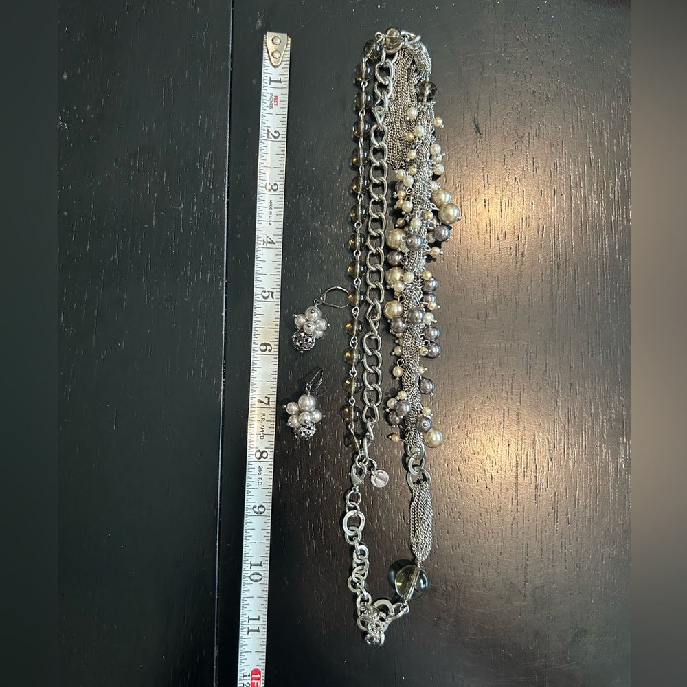 Faux pearl, crystal bead and silver necklace and pierced earrings.